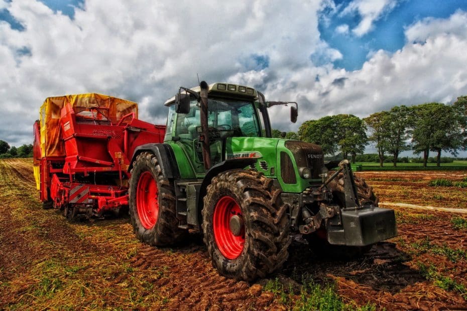 tractor with attached agricultural equipment