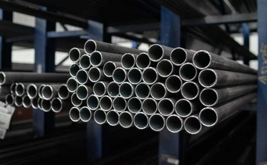 closeup of gray industrial steel pipes used for prefabricated pipe spools