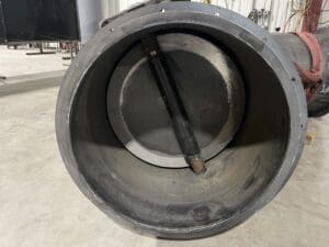 inside of discharge dampener blower pipe